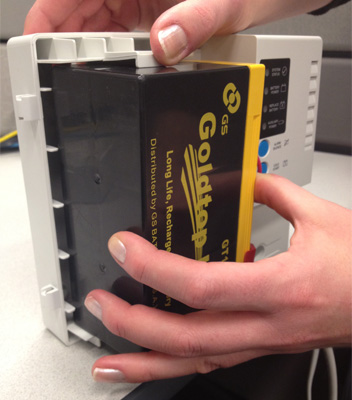 UPS-1215 putting battery back in