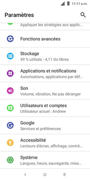 Faites défiler, puis touchez Système.