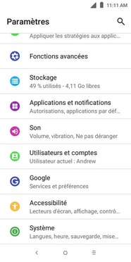 Faites défiler puis touchez Système.