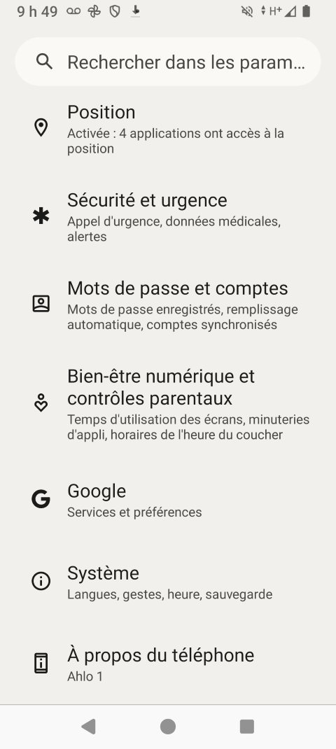 Faites défiler puis touchez Système.